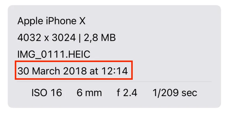 Metadata Editor photo details on iPhone highlighting the file creation date